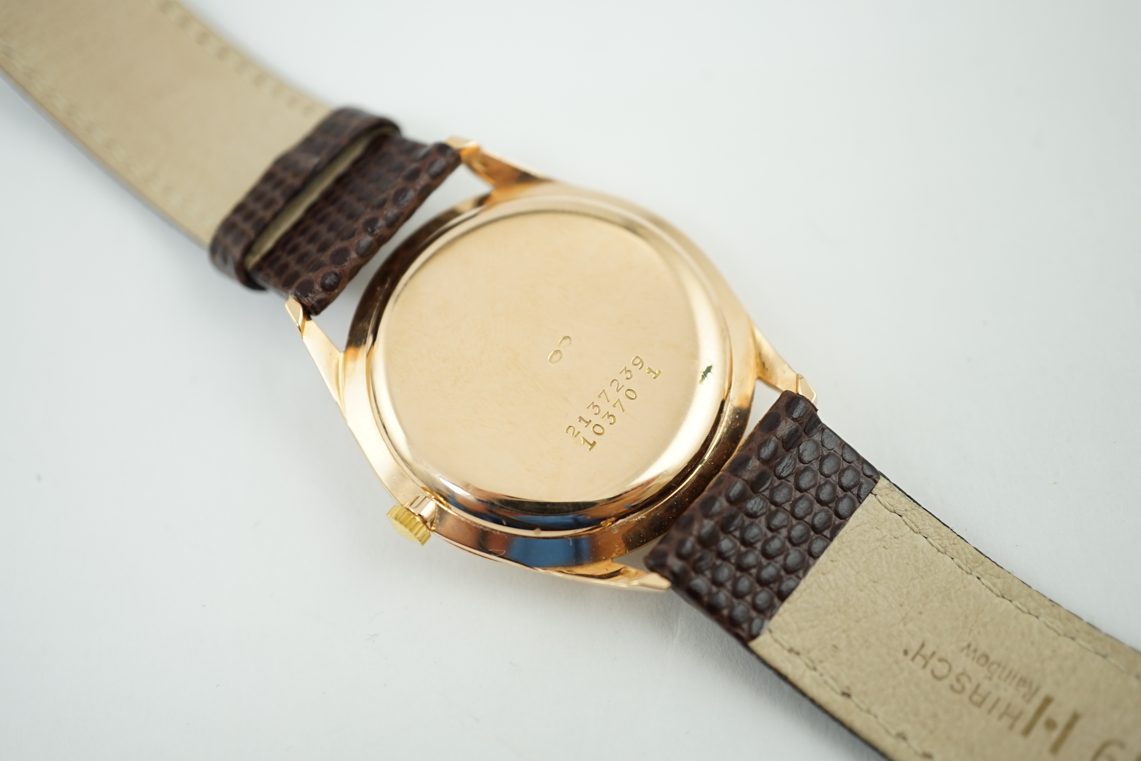 A gentleman's 1950's 18k pink gold Universal automatic wrist watch